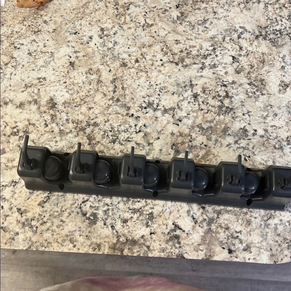 Mop and broom holder